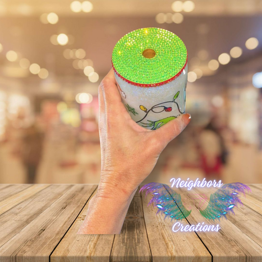 Double Wall Glass Grinch Christmas Cup With Green Bedazzled Lid with Red Trim around the Rim of the lid